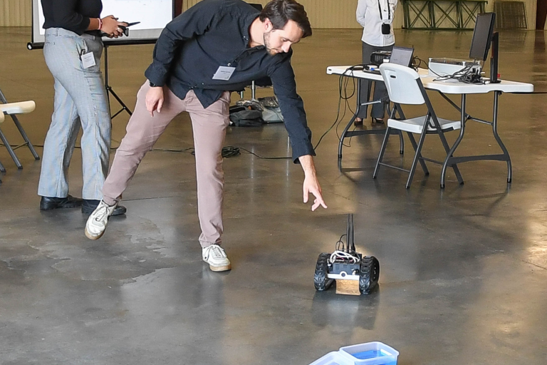 The team at GTRI uses a UGV to demonstrate the speed, accuracy and specificity of Salvus™ Detection Technology for guests at the Salvus open house on Nov. 3 in Valdosta, Ga.